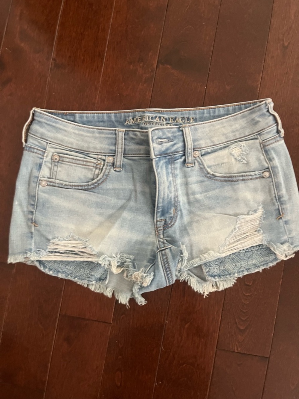 American Eagle Outfitters Low Rise Light Wash Distressed Denim Shorts